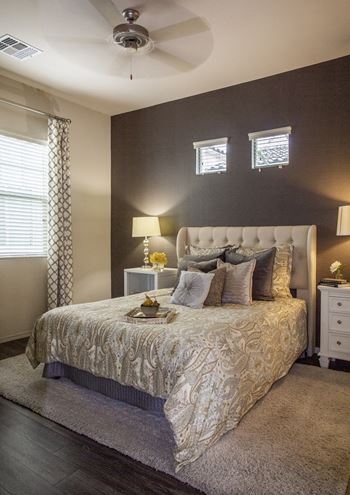 Spacious bedrooms with ceiling fan